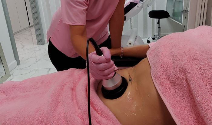 Body sculpting treatment in progress